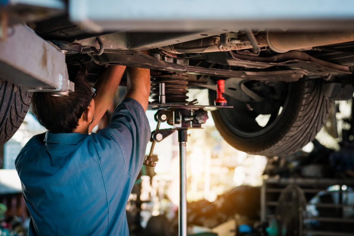 mechanic working on a vehicle 